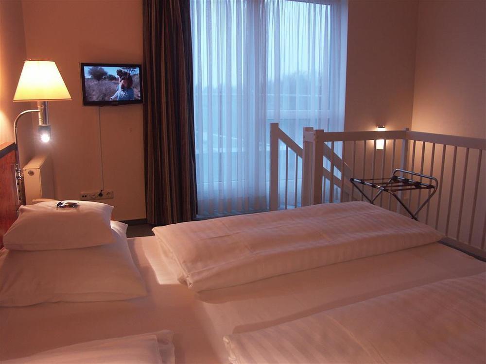 Hotel Arkadia Friedrichsdorf Rum bild